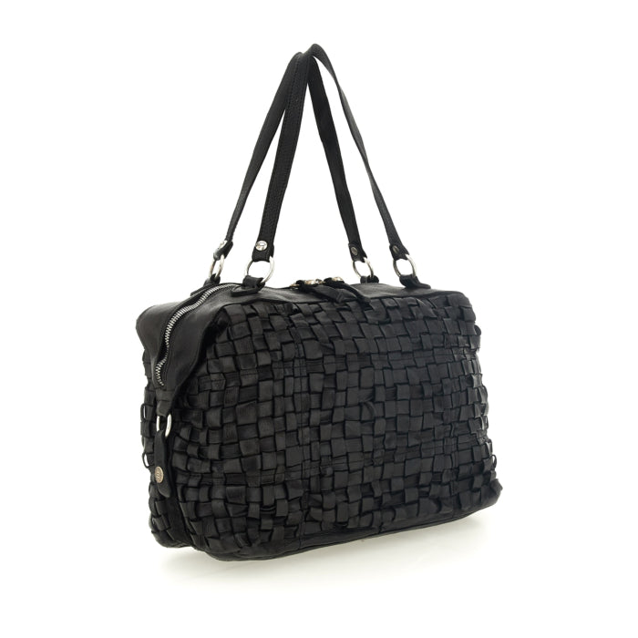 Campomaggi multi-pocket bag with studs and twist lock closure