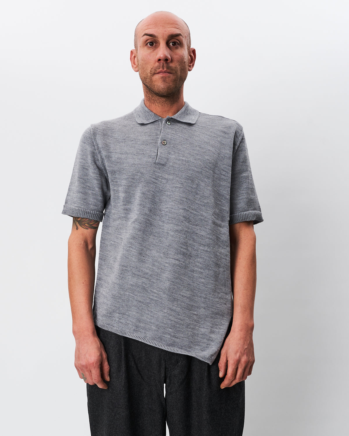 Comme des Garçons polo grigia asimmetrica in lana