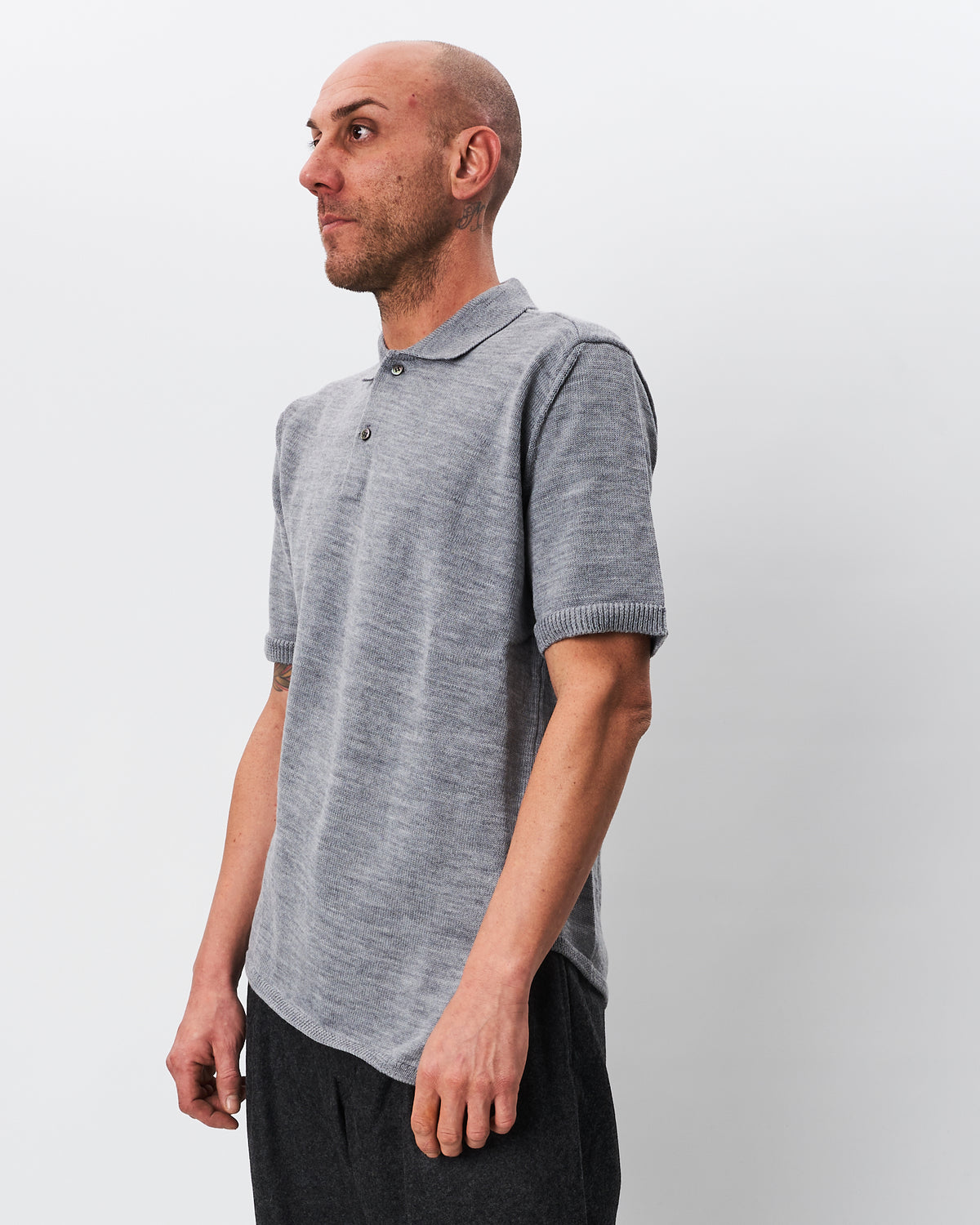 Comme des Garçons polo grigia asimmetrica in lana