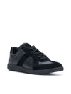 Sneakers modello Replica total black Maison Margiela